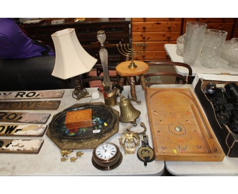 A bagatelle board; brass tray; a bell; an AA badge; a table lamp and shade; wooden stool; quartz wall clock; brass ornaments 