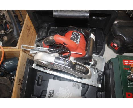 A Black & Decker KS65K electric circular handsaw in fitted plastic case with instruction guide