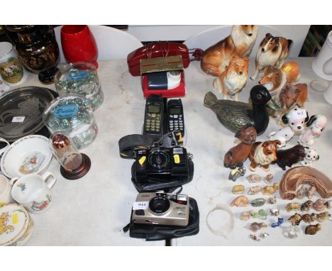 A Hanimex camera, a Halina Silhouette camera; two Nokia phones; a vintage telephone and a shaver