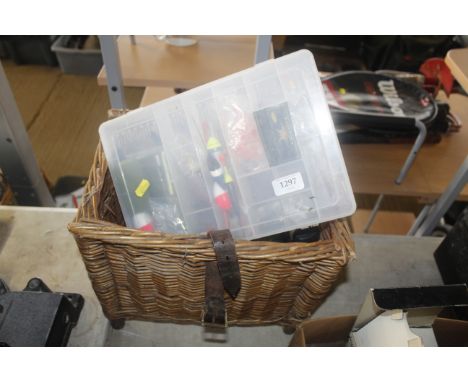 A wicker basket with hinged lid and contents of various fishing accessories including floats, lures, fishing reels etc