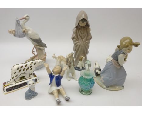 Three Lladro figures; Afghan Hound, 'Special Gift' no. 6228 and girl with puppy, Nao figure of a boy with dog, Royal Copenhag