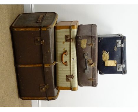 Early 20th century wooden bound travelling trunk (W87cm, H44cm, D52cm) and  three smaller travelling cases
