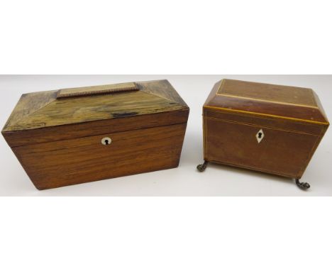 Regency mahogany and boxwood strung two division tea caddy of sarcophagus form, with two lion mask loop handles on paw feet, 