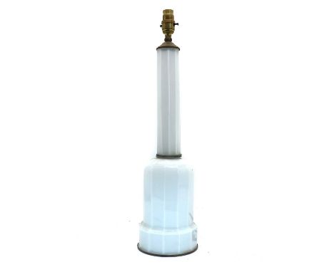 A milk glass table lamp,20th century, of faceted form with a slender column,55.5cm high, lacking shadeCondition ReportNo shad