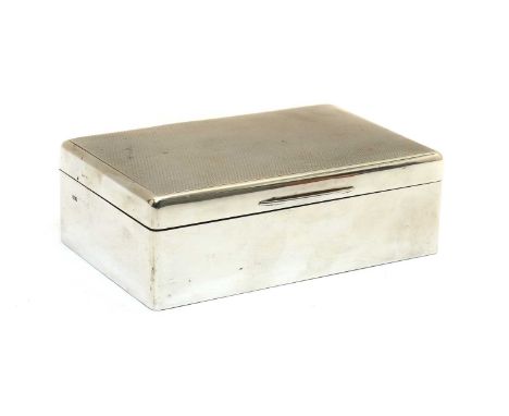 A silver mounted cigarette box,by Dudley Russell Howitt, Birmingham 1946, the lid with engine-turned decoration,14cm wide9cm 