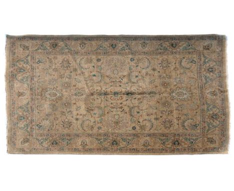 A Turkish Oushak carpet,with scrolling foliate motifs to an oatmeal ground,360cm x 280cmCondition ReportEven wear and fade th