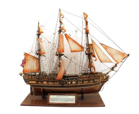 A scratch-built wooden model of the HMS Pandora, late 20th century, on an oak veneered base bearing a plaque describing the v