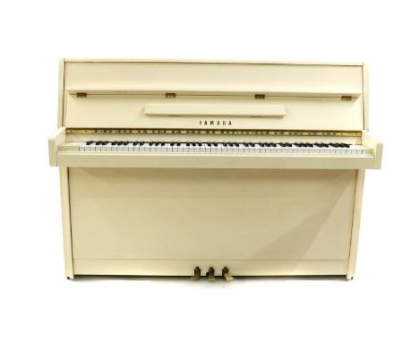 A Yamaha model M110N white lacquered upright piano serial no. E274342 148cm wide 54cm deep 111cm highCondition ReportMinor sc
