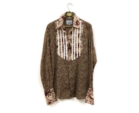 A Vivienne Westwood shirt, circa 1990s, with floral collar, bib front and cuffs and the body in a leopard print design, the l