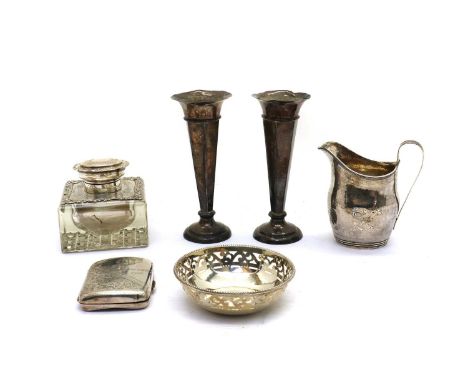 A collection of silver items,comprising a silver mounted glass inkwell, by Henry Matthews, Birmingham 1905, the lid with a pi