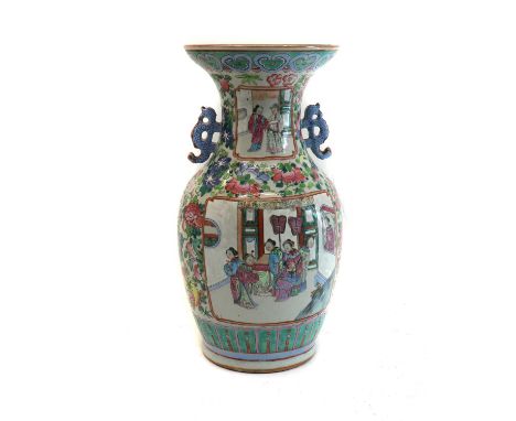 A Chinese porcelain famille rose vase,19th century, decorated with figural panels amongst floral borders,42.3cm highCondition