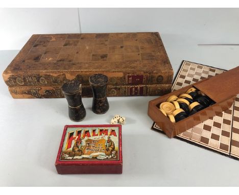 Vintage Games, antique backgammon set, the board bound in leather, and a boxed Halma game with board 