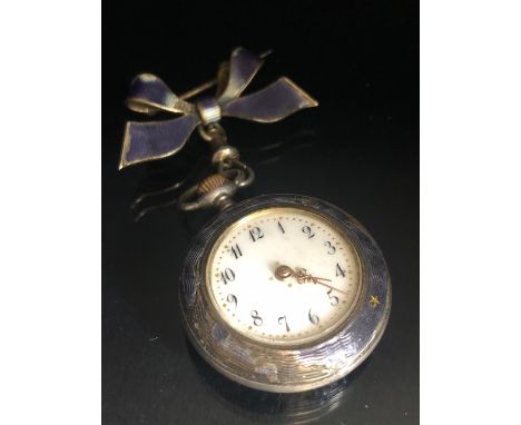 Silver 925 brooch style fob watch with white ceramic face on a bow clasp with all over purple enamel and gold detailing (wind