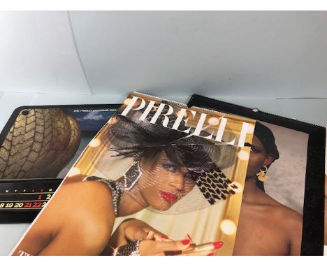 Collection of four Pirelli calendars 1984, 1986, 1985, 1987 a/f