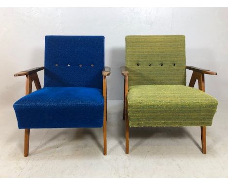Mid Century furniture, a design pair of 1970s Eastern European Arm Chairs, blond wooden frames with leather arm detail, padde