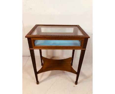 Antique Furniture Mahogany Bijouterie display table, glass top and 4 sides, the frame and tapered  legs with carved scrolling