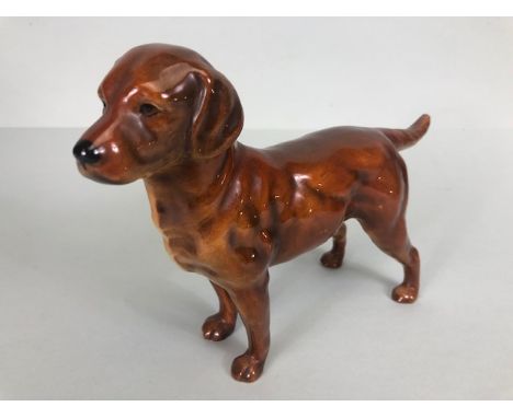 Vintage china figurine of a young Labrador dog by German manufacturer Goebel, pattern number CH616, approximately 16cm high