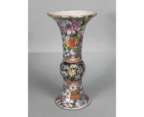Oriental Ceramics, tall Chinese Famille Noir vase of archaic shape decorated in multi coloured  millefleur, red character sea