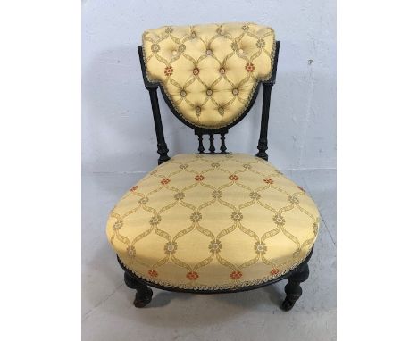 Antique furniture, Victorian Nursing chair, Ebonised wooden frame with padded seat and padded button back 