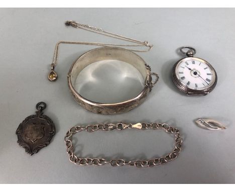 Silver jewellery to include antique fob watch, opening engraved bangle, chain bracelet, Fob, stone set pendant and chain, pen