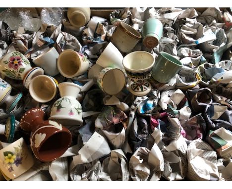Large collection of ceramic egg cups