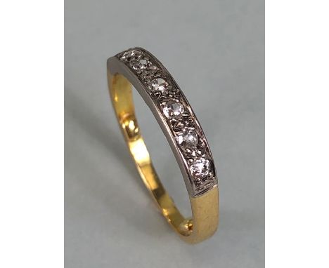 Antique Jewellery, yellow and white metal quarter eternity ring set with 7 diamonds approximately size O and 3.5g total 