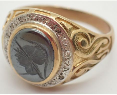 9ct gold and onyx gents ring size Y with carved centurion head 8.2g