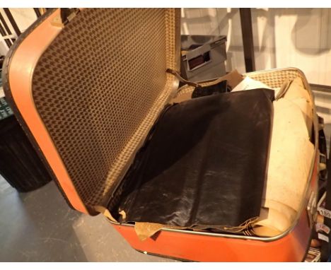 Vintage suitcase with leather samples