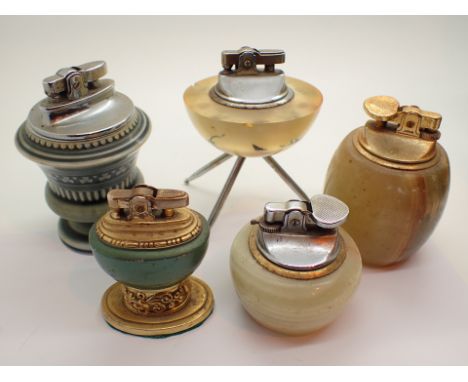 Five vintage table cigarette lighters including Onyx 