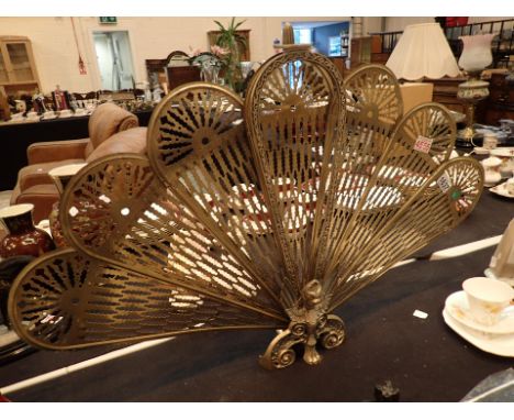 Vintage folding brass peacock fire screen