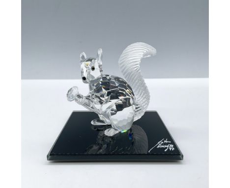 Beautiful clear crystal with frosted tail. Issued in celebration of the 10th Anniversary of the SCS. The squirrel holds a dia