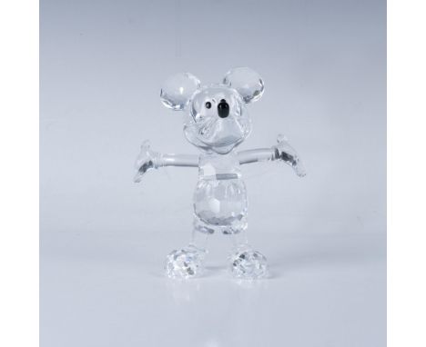 A clear Mickey Mouse with arms stretched out in excitement, featuring white and black crystals for his eyes and nose. Swarovs