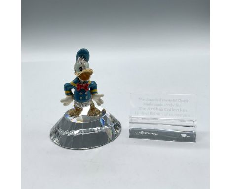 This limited edition enameled and gilded figure is embellished with hand-set Swarovski crystal rhinestones. Colored in turquo