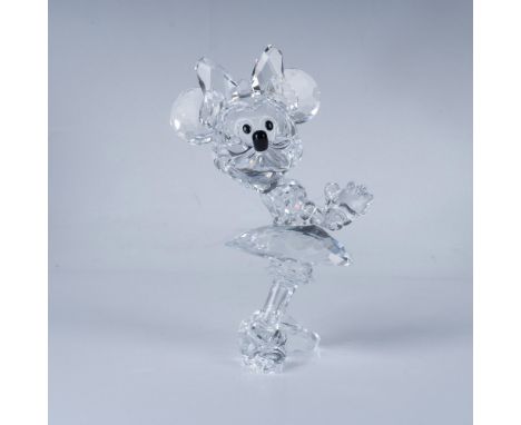 A clear Minnie Mouse with her hands clasped together in a sweet, pleading pose, adorned with white and black crystals for her