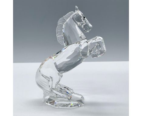 Beautiful facetted clear crystal with frosted mane and tail. Swarovski etched backstamp. This item has its original box, dime