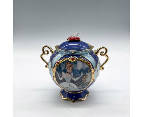 Lovely enameled footed globe with gilt accents on handles and bordering designs. Paneled design of Cinderella and her carriag