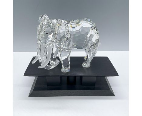 From the Inspiration Africa trilogy. Features facetted clear crystal with frosted tusk and black eyes. Includes a wooden base