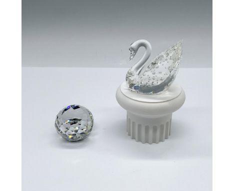 A clear crystal swan with 100 individual stones; commemorating Swarovski 100th year. Includes plastic column base and a Swaro
