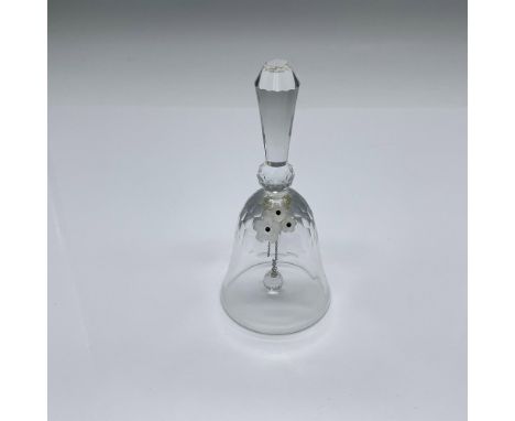 Part of the Exquisite Accents group. A clear crystal bell with three frosted flowers with black centers. Swarovski swan mark.