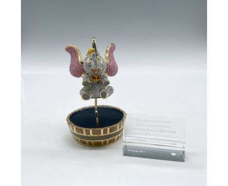 Limited edition figure is bejeweled in colored Swarovski crystals with gilt accents and enameled hat, feet. Comes with his ow