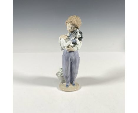 Glossy finish; Lladro backstamp. This item comes with original box which measures 5.75"L x 11"W x 5"H. Artist: Antonio RamosI