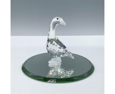 Gorgeous clear facetted crystal body with frosted beak and feet. Swarovski etched backstamp. Accompanied by a round mirrored 
