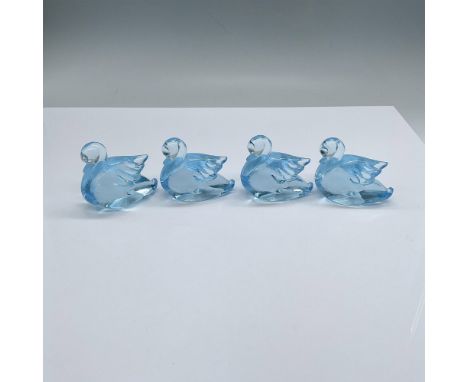 Four light blue glass cygnets with the Imperial Glass hallmark. Issued: 1980sDimensions: 2.5"L x 1.25"W x 2.25"HManufacturer: