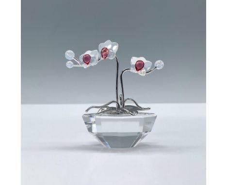 Stunning floral piece with a clear crystal base, rhodium leaves and stem and colored crystal flowers. Swarovski etched backst