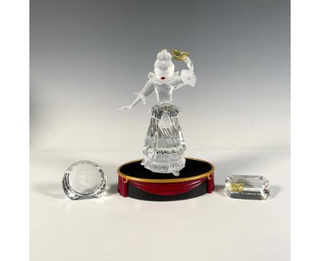 Columbine 242032. Elegant woman in a masquerade gown, adorned with vibrant red, blue, and yellow accents, holding a striking 