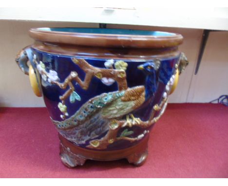 VERY LARGE ANTIQUE MAJOLICA PLANTER WITH PEACOCK DECORATION AND ELEPHANT HANDLES BY MINTON