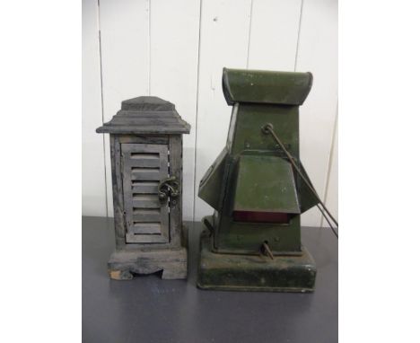 ANTIQUE BLACKOUT LIGHT AND A WOODEN CANDLE HOLDER