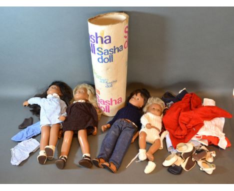 A collection of four Sasha dolls with clothing 