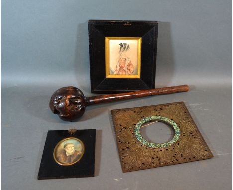 A brass picture frame of square form, together with two portrait miniatures and knob kerry