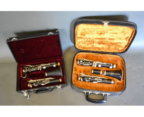 A clarinet by Fairfield in case together with another similar 
